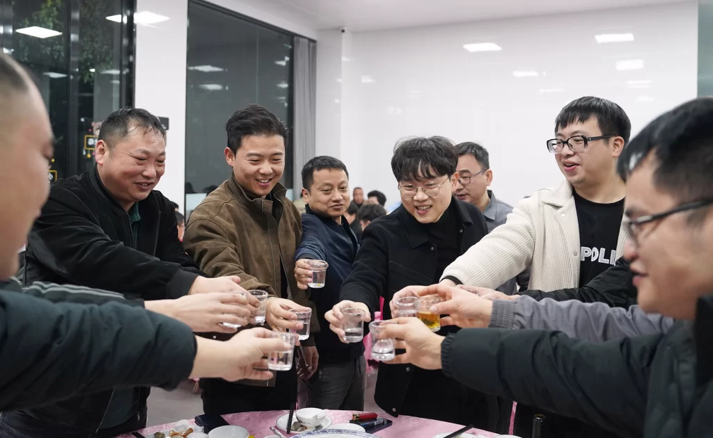 HongFilms employees celebrating together at the year-end dinner ahead of the Spring Festival holiday